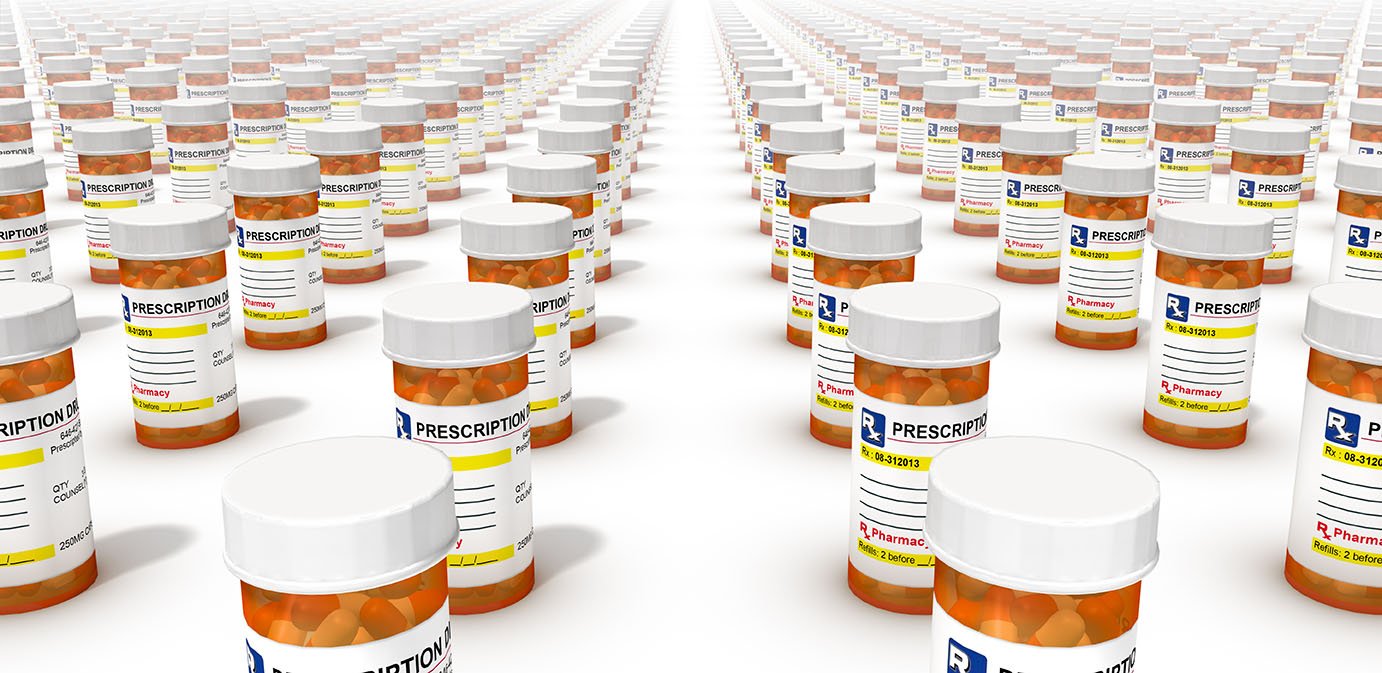 Prescription pill bottles lined up